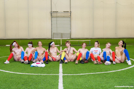 Petite young soccer players undressing and rubbing each other's muffs