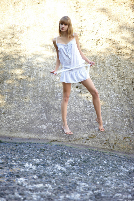 Adorable babe Veda A shows her awesome bush & her little ass outdoors