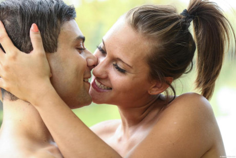 Barely legal young Naomi Bennet licks and fucks her man next to lake