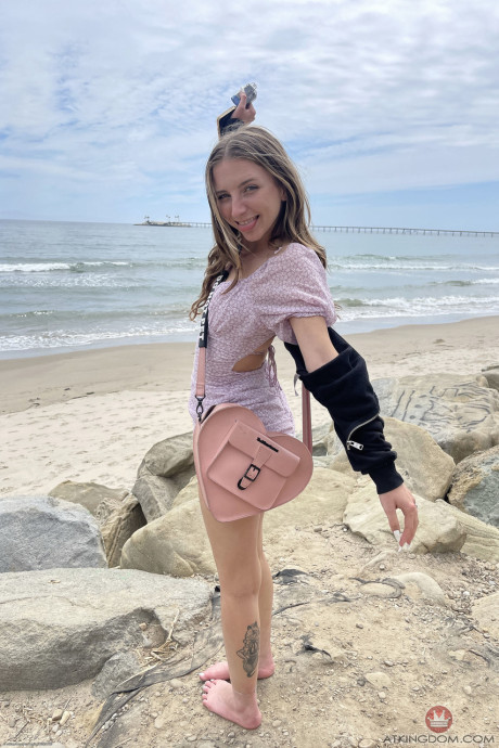 Ravishing teen Macy Meadows shows her tiny tits and presents her cunt