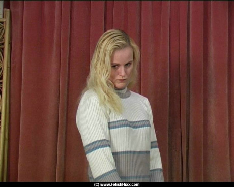Blonde teen has her bare behind turned red during a caning session