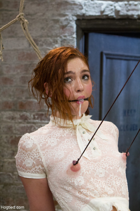 Redheaded babe Jodi Taylor gets punished with a vibrator in bondage