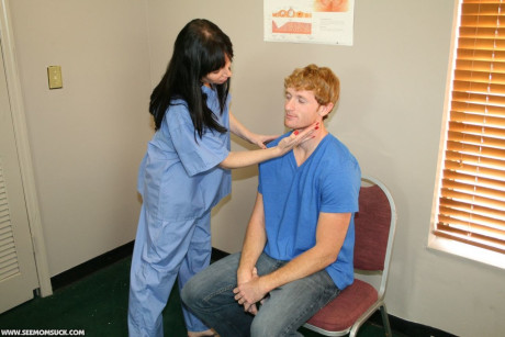 Dark haired MILF nurse gives a sexy lovely blowjob to her horny patient