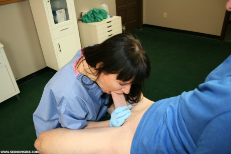 Dark haired MILF nurse gives a sexy lovely blowjob to her horny patient