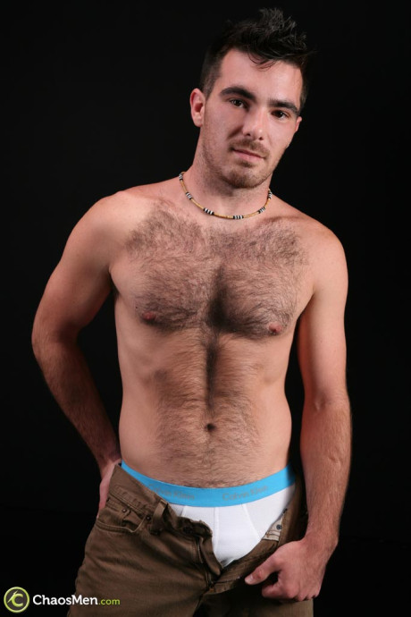 Hairy gay bear Colton shows off his bushy chest and cock before jerking