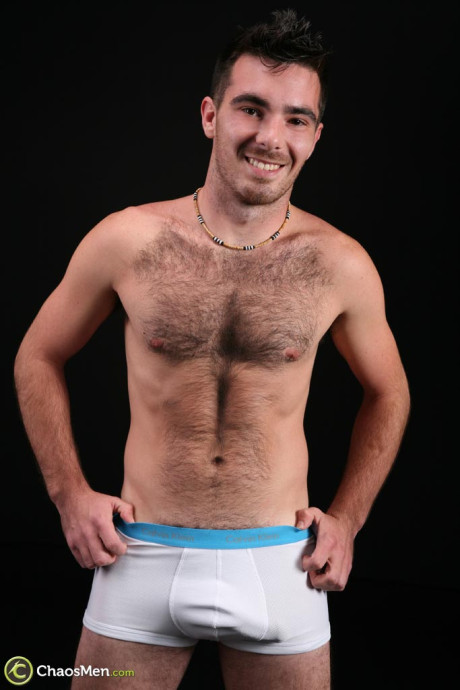 Hairy gay bear Colton shows off his bushy chest and cock before jerking