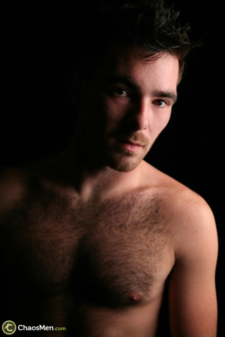 Hairy gay bear Colton shows off his bushy chest and cock before jerking