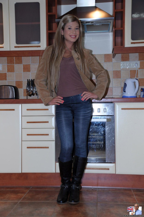 Skinny European babe Tiffany F teases with her hot body while stripping