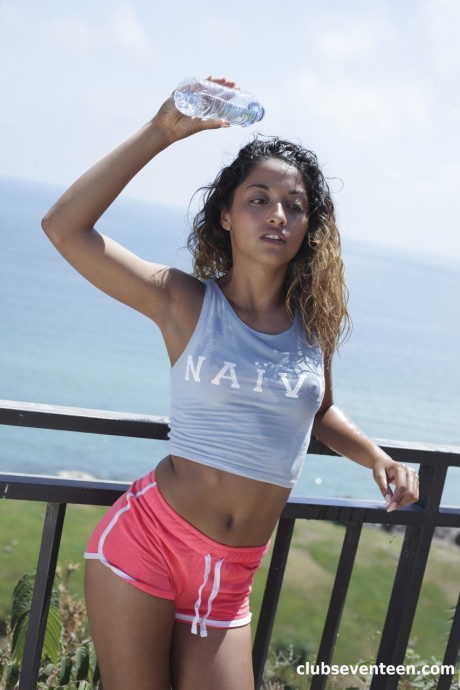 Exotic young Scarlet reveals her pointy nipples and attractive behind outdoors