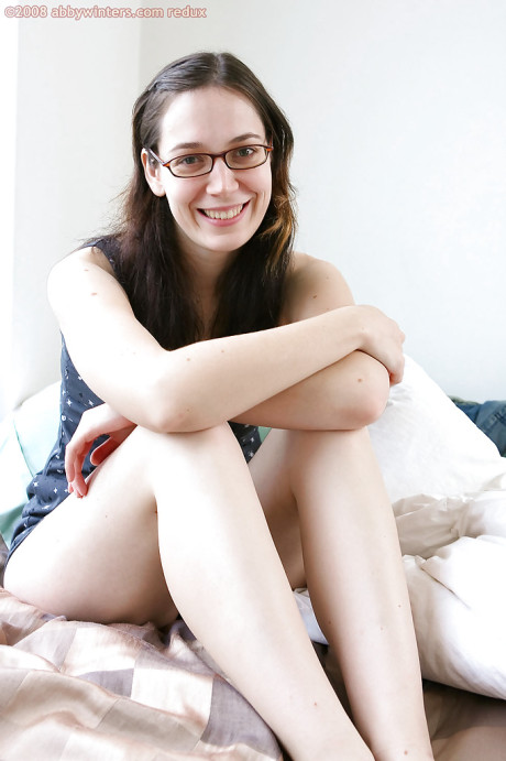 Nerdy brunette amateur Gabrielle bends over for furry cunt spreading