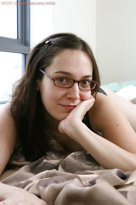 Nerdy brunette amateur Gabrielle bends over for furry cunt spreading