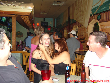 Chesty swinger Double Dee lets different studs blow her massive tits at the bar