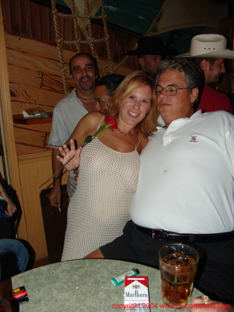 Chesty swinger Double Dee lets different studs blow her massive tits at the bar