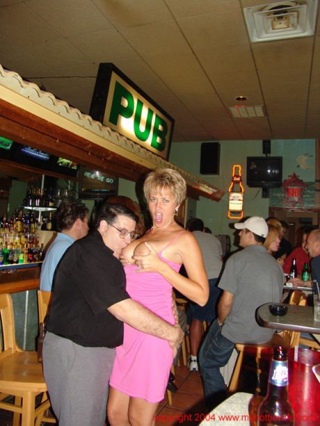 Chesty swinger Double Dee lets different studs blow her massive tits at the bar