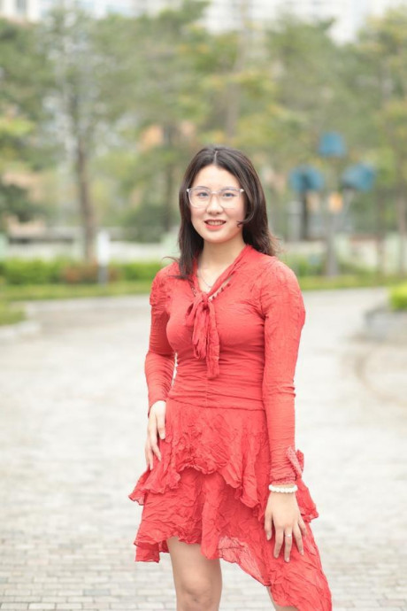 Thin oriental babe with eyeglasses posing in her tight skirt in public