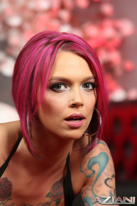 Pink haired hottie Anna Bell Peaks shows her big boobs and poses in a solo