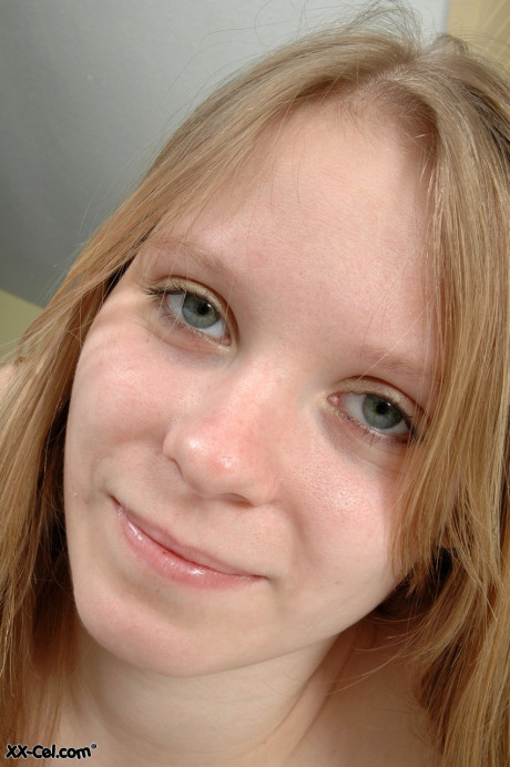 Amateur cutie Caroline exposes her huge natural knockers and charming soles