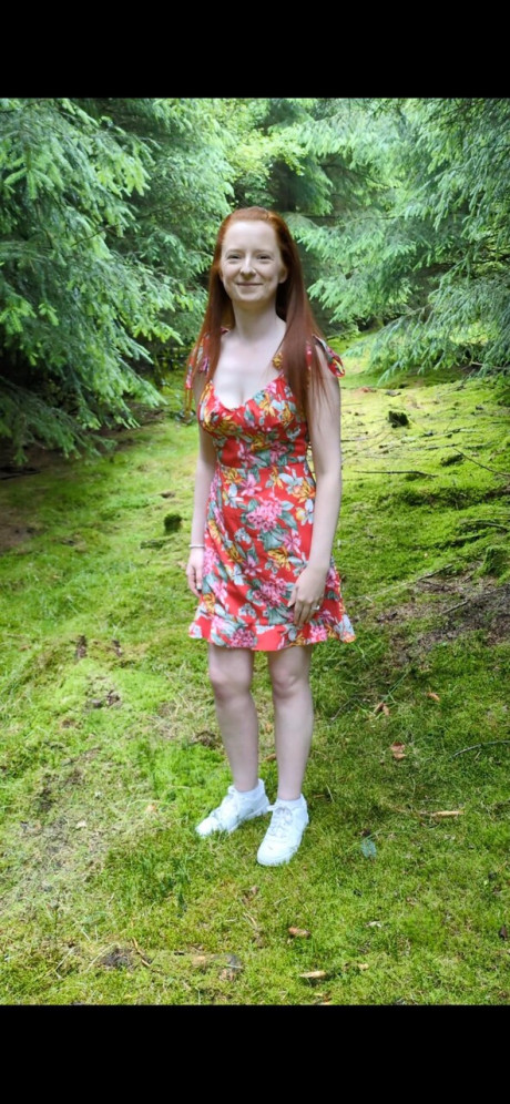 OnlyFans teen ginger head Shannen strips in the forest and shows her big ass