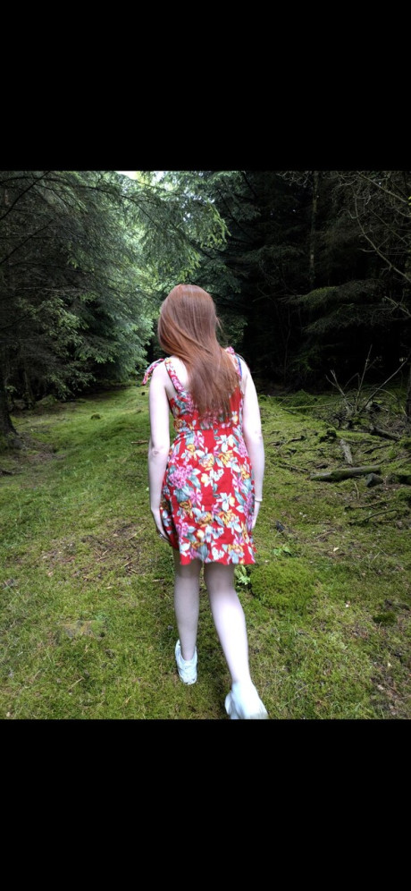 OnlyFans teen ginger head Shannen strips in the forest and shows her big ass