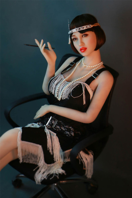 Dark haired flapper sex doll Prudence flaunts her large nipples and big juggs