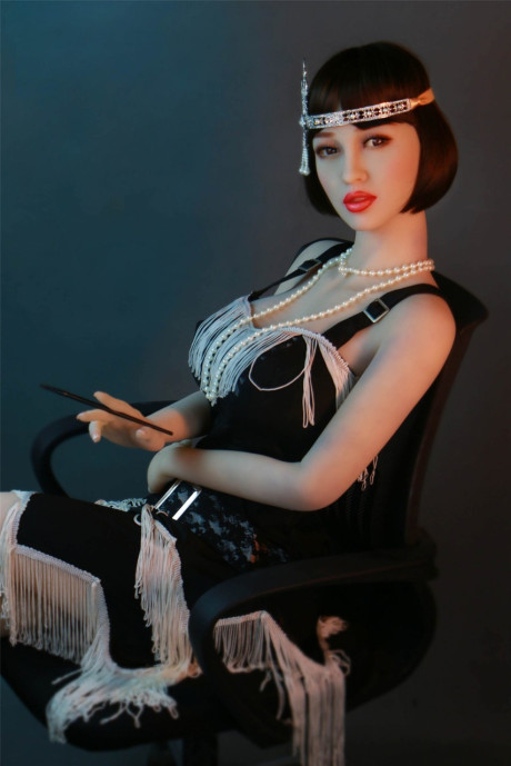 Dark haired flapper sex doll Prudence flaunts her large nipples and big juggs