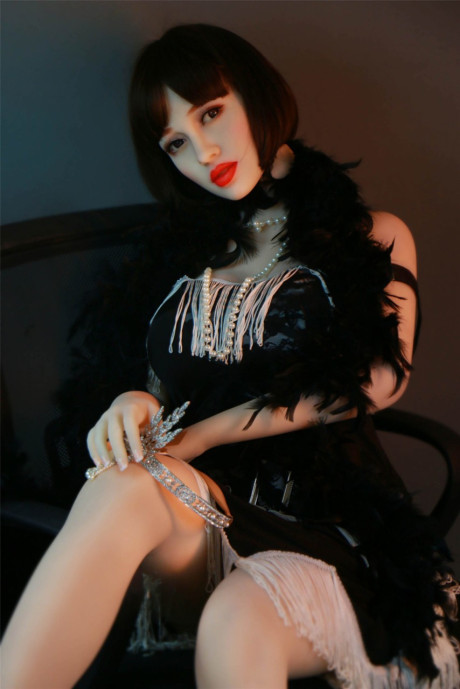 Dark haired flapper sex doll Prudence flaunts her large nipples and big juggs