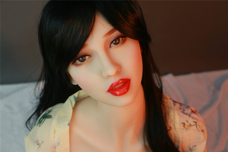 Dark haired flapper sex doll Prudence flaunts her large nipples and big juggs