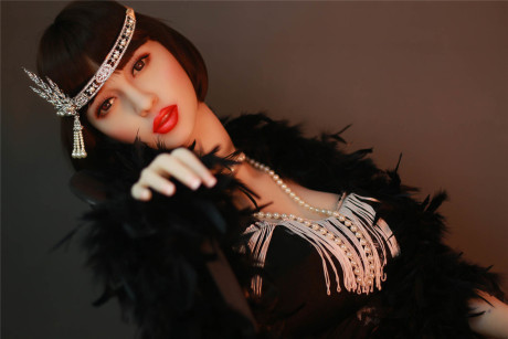 Dark haired flapper sex doll Prudence flaunts her large nipples and big juggs