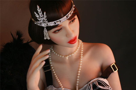 Dark haired flapper sex doll Prudence flaunts her large nipples and big juggs