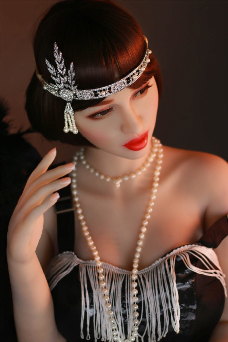 Dark haired flapper sex doll Prudence flaunts her large nipples and big juggs