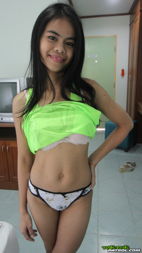 Little Thai girl Ann reveals her perfect tiny thin body and trimmed pussy