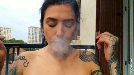 Amateur babe Evgenia Talanina showing off her cute tattoos & enormous tits