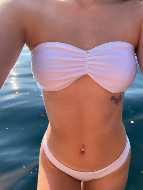 Nice young Brianna Bums poses in swimwear during a trip to the lake