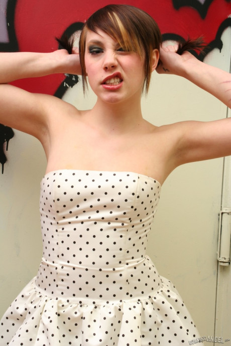 Adorable fetish young in polka dot dress flashes her plump butt in undressed upskirt