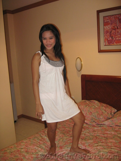 Pretty Filipina Claudia Antonio strips, poses undressed and humps a penis