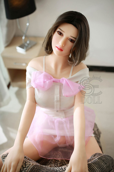 Beautiful pretty sex doll Gwendolyn shows her fabulous gigantic breasts and pink cunt