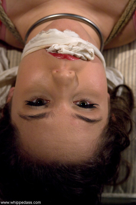 Redheaded lezdom Claire Adams restrains Charlotte Vale and toys her snatch
