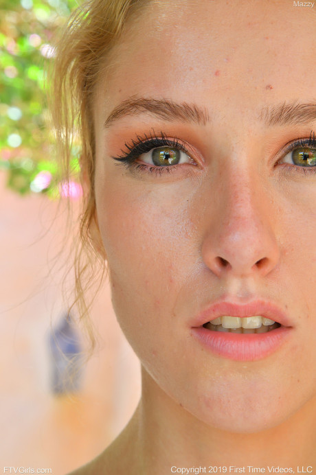 Amateur babe Mazzy stuffing pink balls into her tasty pink snatch