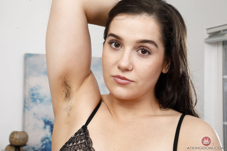 Brunette bombshell Kasey Warner spreads her trimmed vagina up close