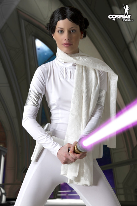 Living doll wields a lightsaber while emulating Princess Leah