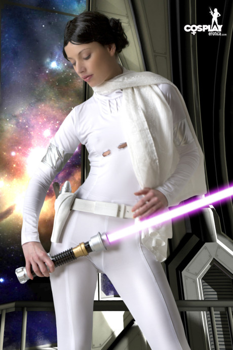 Living doll wields a lightsaber while emulating Princess Leah