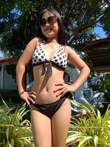 Slutty Filipina teenie poses in cute bikinis outdoors and in the pool