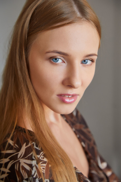 Blue-eyed teenie Nimfa unveils her slim figure and flaunts her shaved love holes
