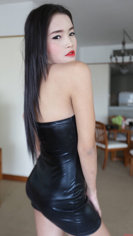 Leather-clad t-girl Ice strips, poses undressed and loves a POV anal fuck