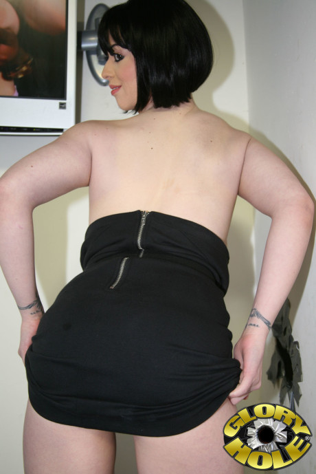 Lovely dark haired bitch woman Larkin Love posing and showing her booty and giant tits