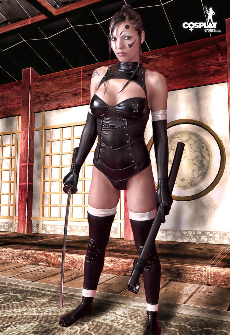 Gorgeous pretty brunette cosplayer releases her increased melons from her outfit