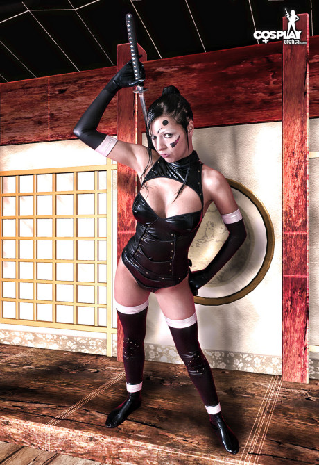 Gorgeous pretty brunette cosplayer releases her increased melons from her outfit