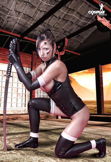 Gorgeous pretty brunette cosplayer releases her increased melons from her outfit