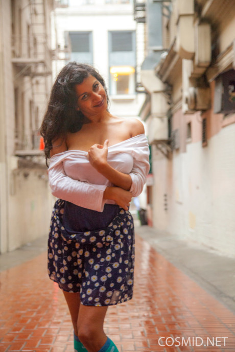 India amateur Carla White unveils her giant natural breasts in an alley by the mall