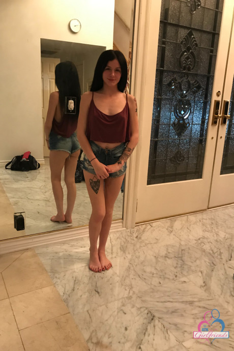 Petite teen Rosalyn Sphinx shows off her humongous butt & her tiny titties